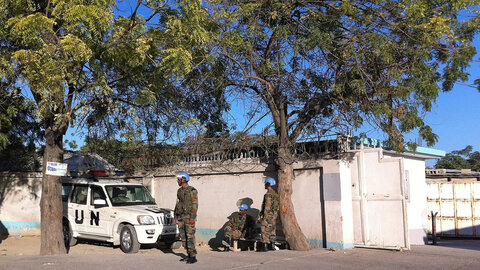 Troops of the UN MINUSTAH mission guarding a facility entrance in Haiti in 2014.