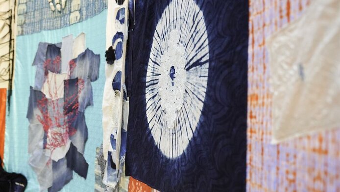 Detailed view of an artistic quilt 