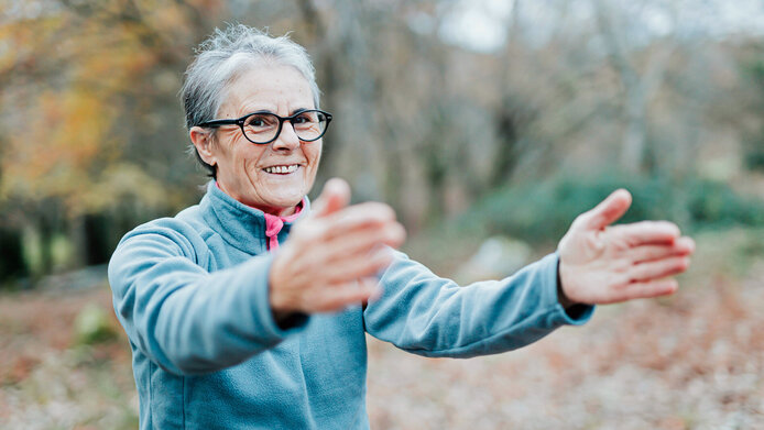 Older woman exercising outdoors