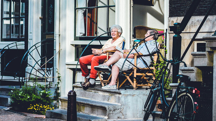 Two elder ladies on staircase